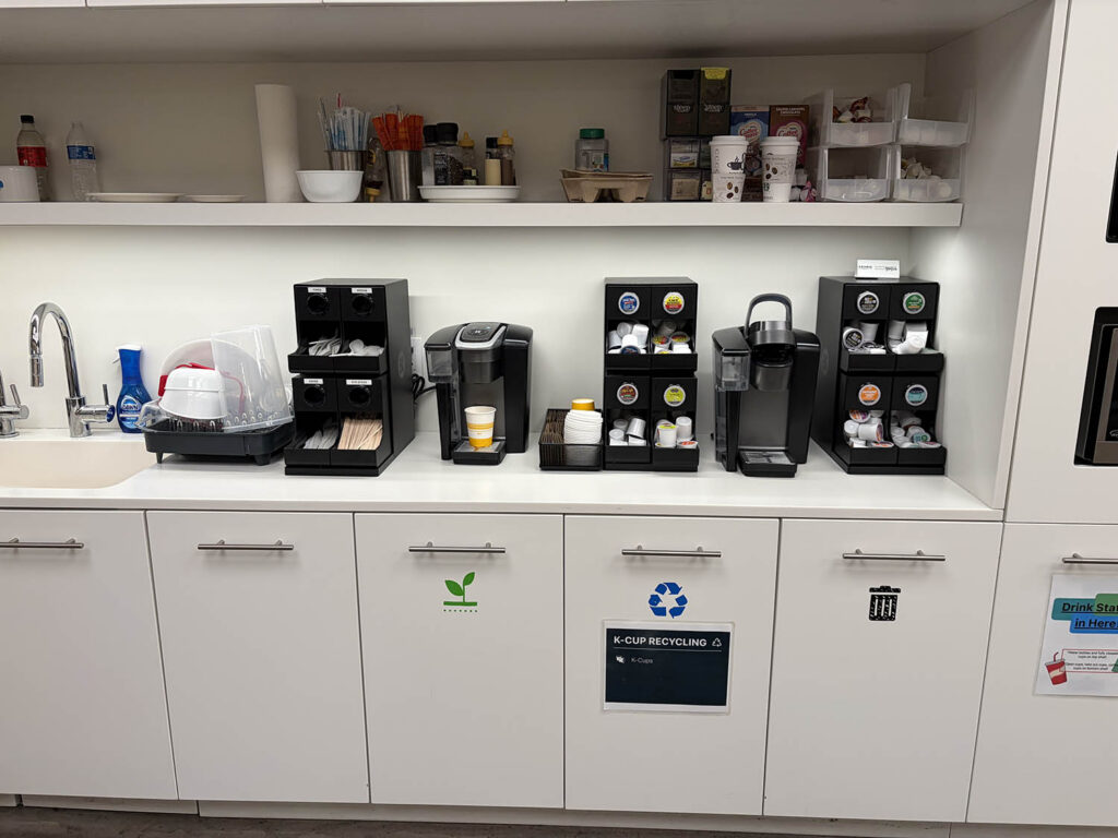 Office break room coffee station and recycling cabinets after office cleaning