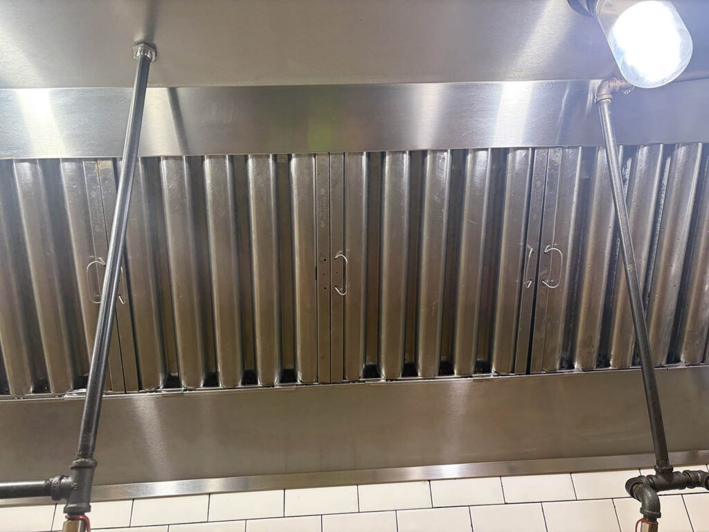 Stainless exhaust hood filters after commercial kitchen cleaning