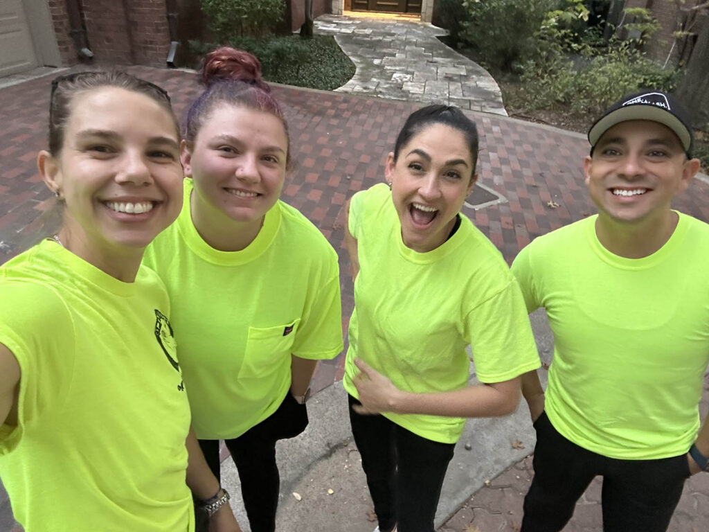 open-hands-cleaning-crew-team-selfie-yellow-uniform-legacy